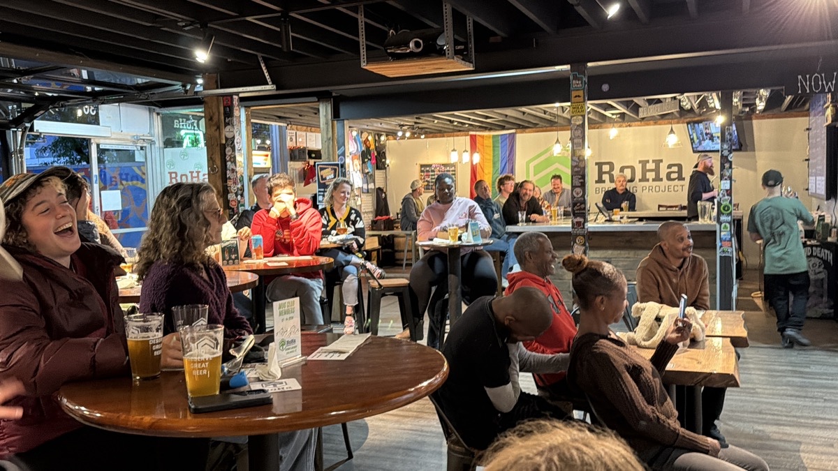 Guests enjoying drinks inside the RoHa taproom